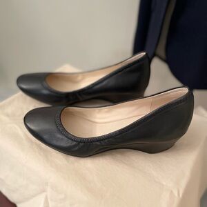 Cole Haan Like new! Black leather wedges heel. Perfect condition. Size 7.